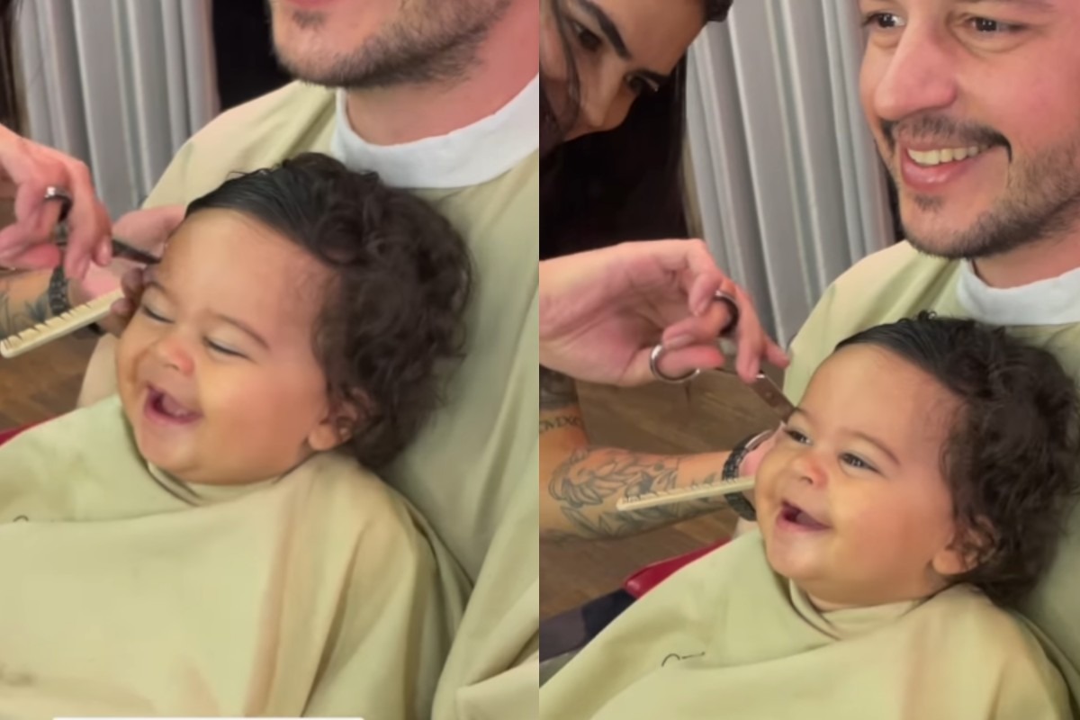 O bebê que cai na risada enquanto é cortado o seu cabelo pela primeira vez.