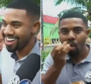 Imagem - Acusado de ameaça, Davi Brito sai da delegacia rindo e comendo pipoca