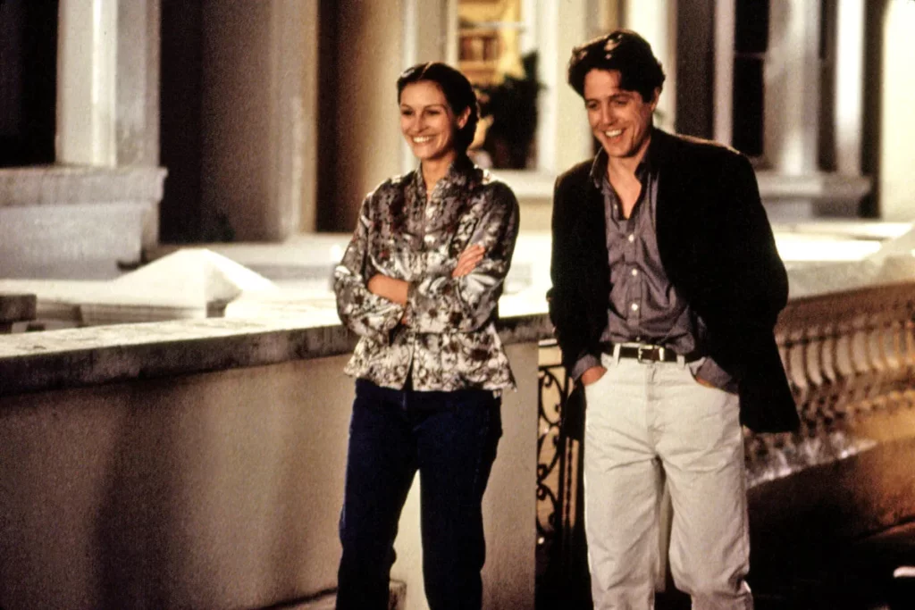 Em &#8220;Um lugar chamado Notting Hill&#8221;, William Thacker e Anna Scott vivem um romance divertido (Imagem: Reprodução Digital | Universal Pictures)