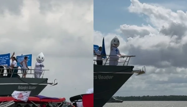 Zé Gotinha anima embarcação durante barqueada pela justiça climática, em Belém