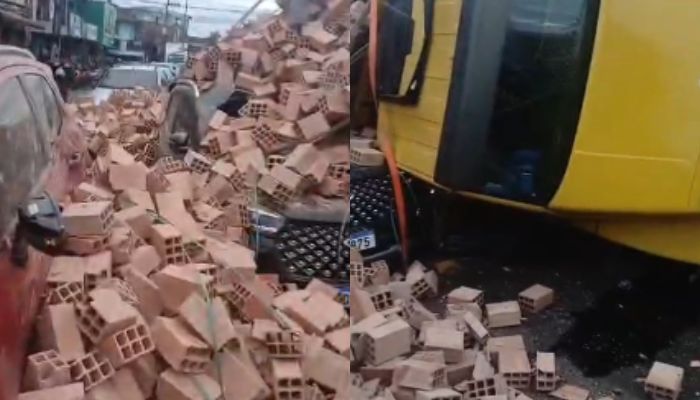 Caminhão tomba em rotatória e carga de tijolos atinge carros na Rodovia do Tapanã