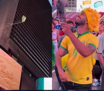 Imagem - Brasileiro solta pipa na Times Square durante a Copa do Mundo