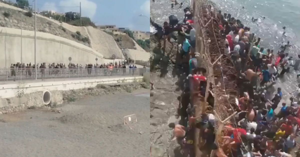Momento em que milhares de imigrantes vindos do Marrocos chegaram a Ceuta, uma cidade autônoma da Espanha.
