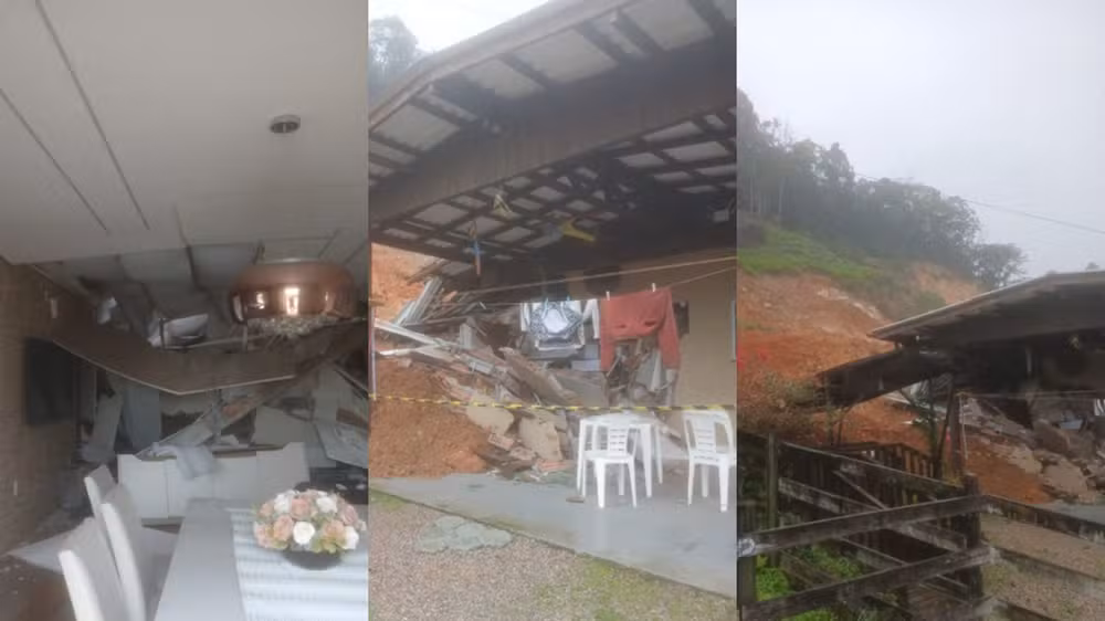 Deslizamento de terra atinge casa em Santo Amaro da Imperatriz.