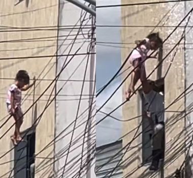 Imagem - Criança cai de janela e fica pendurada em fios elétricos até ser salva por PM em Alagoas